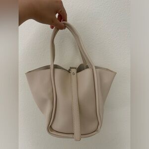 Leather bucket bag with inner zip bag and shoulder strap
